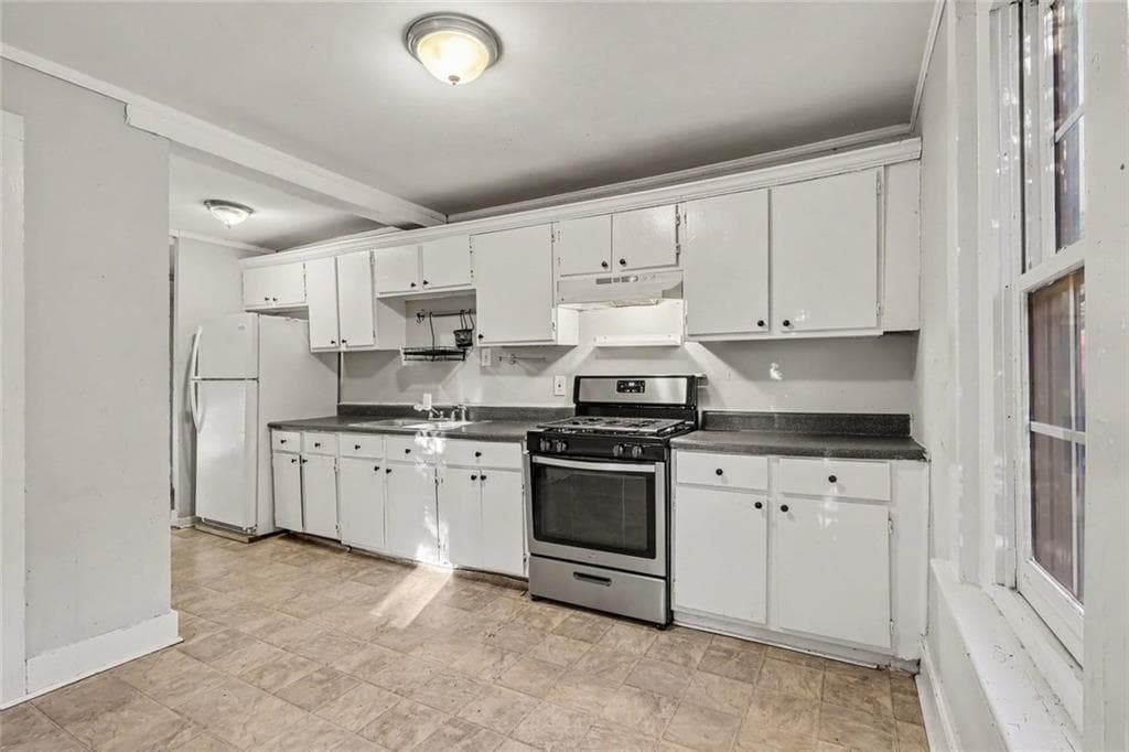 4 bedroom, 2 bathroom, 1,668 sq ft single family residence for sale at 1371 Beatie Avenue, Atlanta, GA 30310 — photo 3