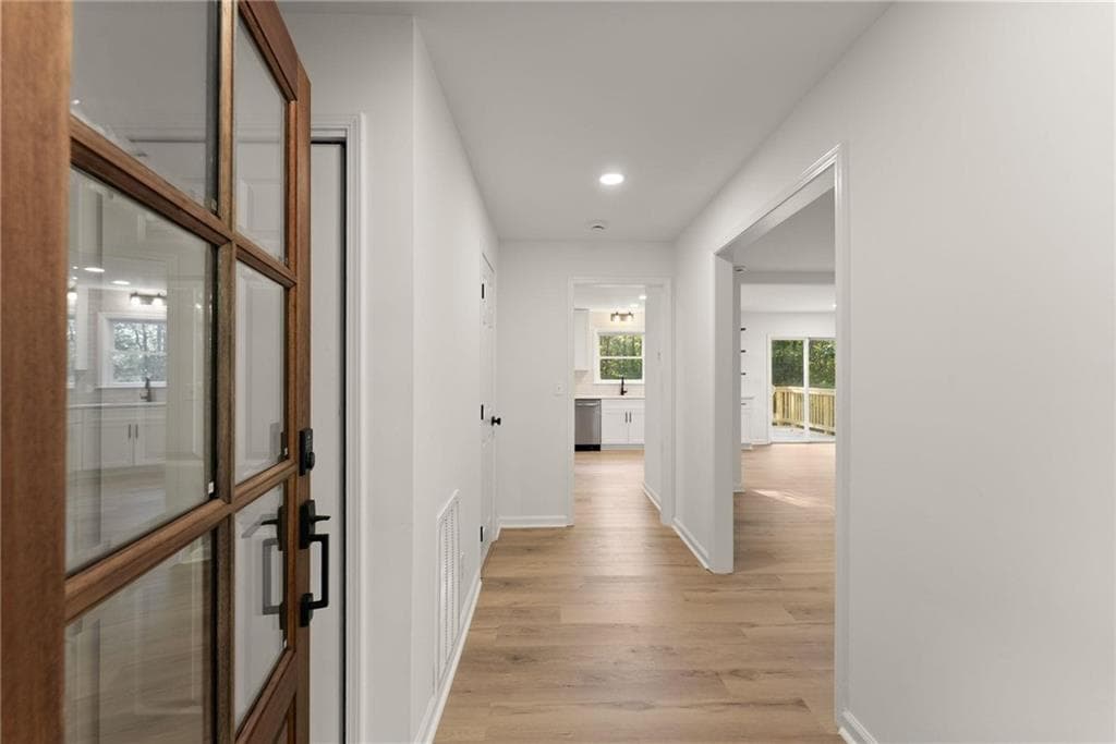 4 bedroom, 4 bathroom, 2,356 sq ft single family residence for sale at 5571 Northwoods Road, Clermont, GA 30527 — photo 2