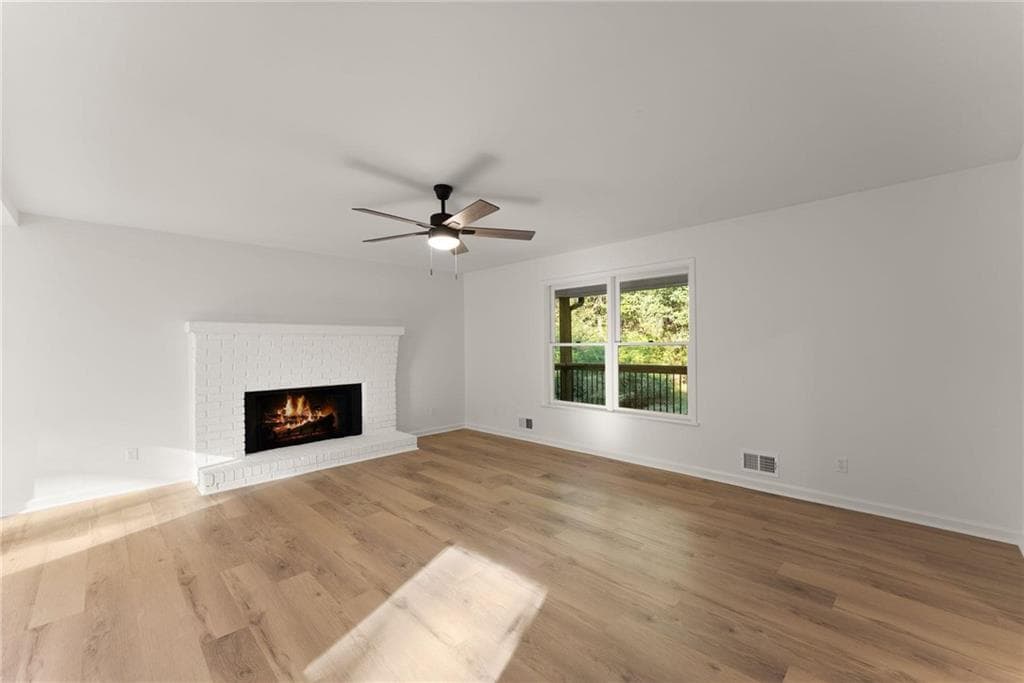 4 bedroom, 4 bathroom, 2,356 sq ft single family residence for sale at 5571 Northwoods Road, Clermont, GA 30527 — photo 4