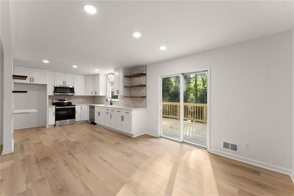 4 bedroom, 4 bathroom, 2,356 sq ft single family residence for sale at 5571 Northwoods Road, Clermont, GA 30527 — photo 6