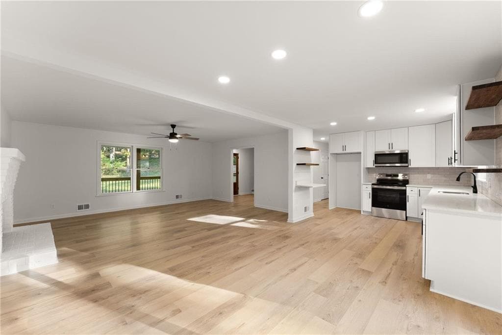 4 bedroom, 4 bathroom, 2,356 sq ft single family residence for sale at 5571 Northwoods Road, Clermont, GA 30527 — photo 7