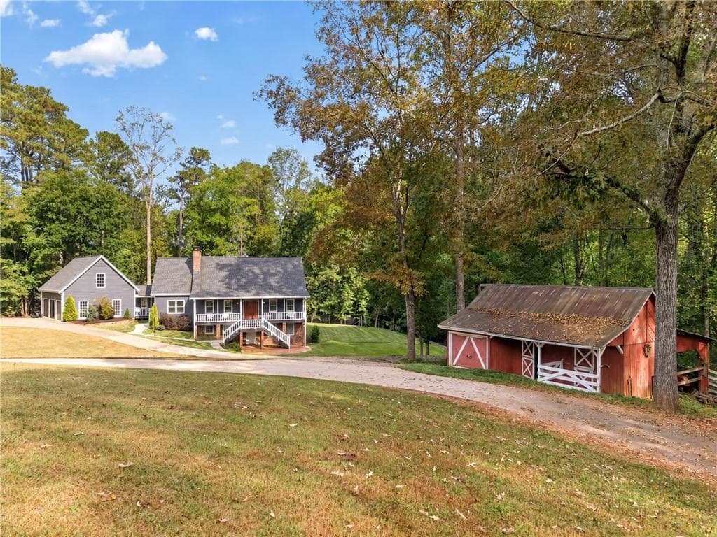 5 bedroom, 4 bathroom, 4,542 sq ft single family residence for sale at 13488 Holly Road, Roswell, GA 30075 — photo 7