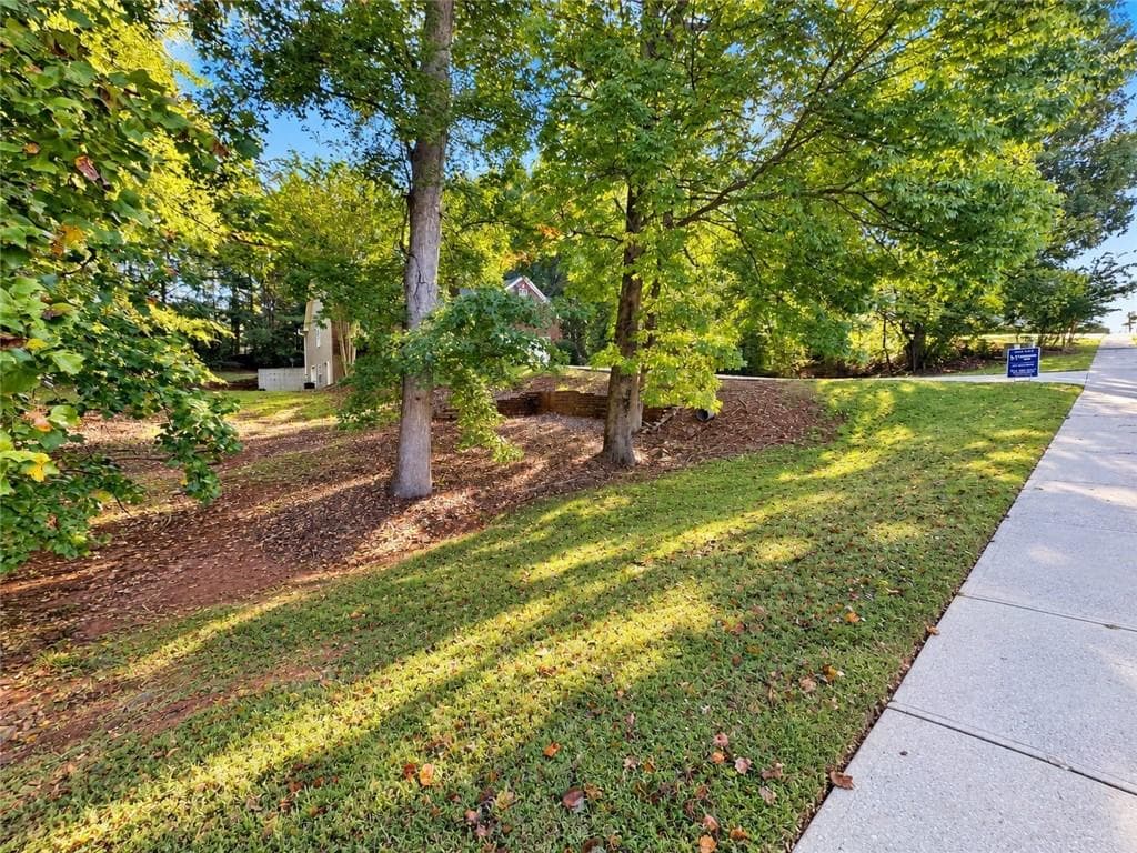 4 bedroom, 2 bathroom, 2,096 sq ft single family residence for sale at 1271 Harvest Lane, Hoschton, GA 30548 — photo 3