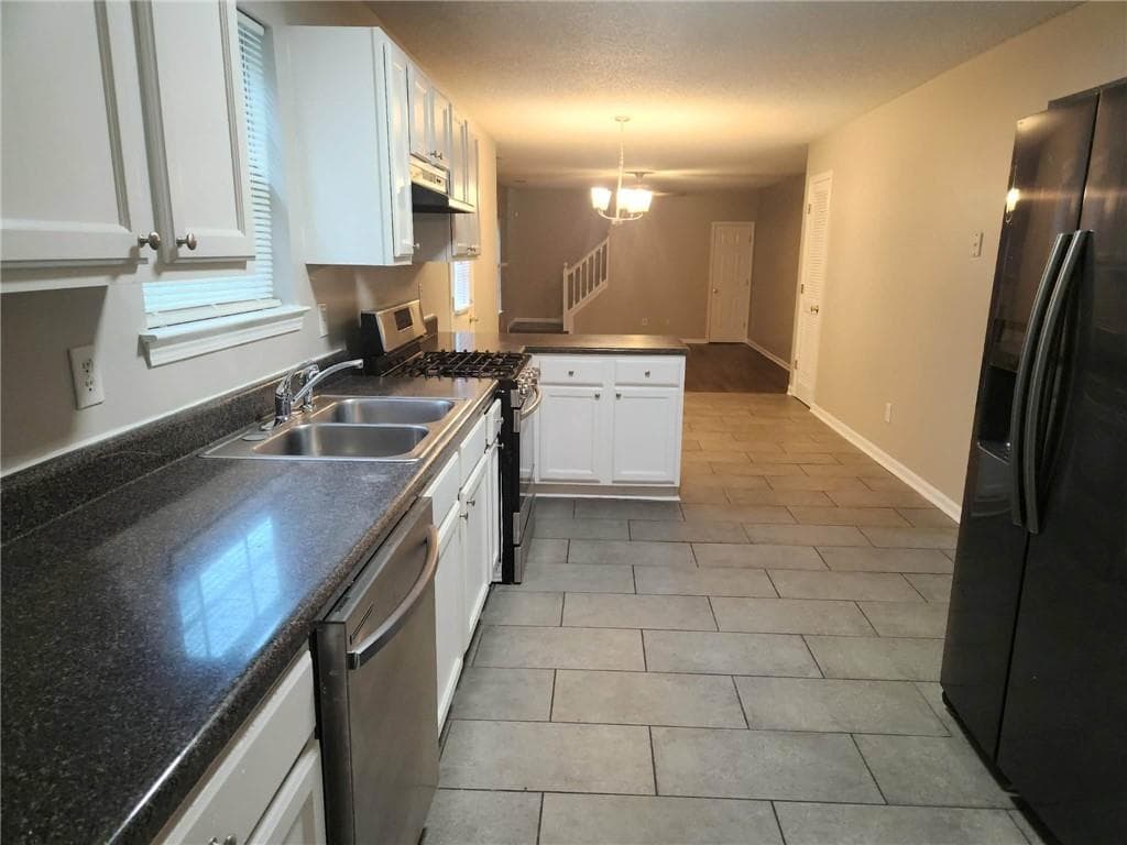 5 bedroom, 3 bathroom, 3,048 sq ft single family residence for rent at 1535 Rogers Crossing Drive, Lithonia, GA 30058 for $2,650 a month — photo 5