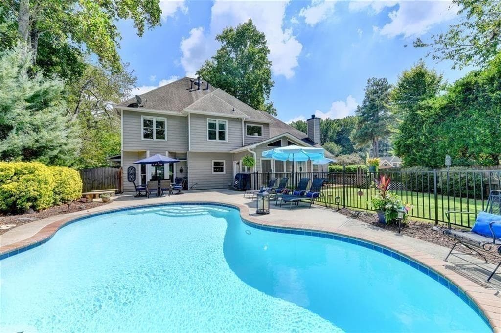 5 bedroom, 3 bathroom, 3,482 sq ft single family residence for sale at 5715 N Hillbrooke Trce, Johns Creek, GA 30005 — photo 6
