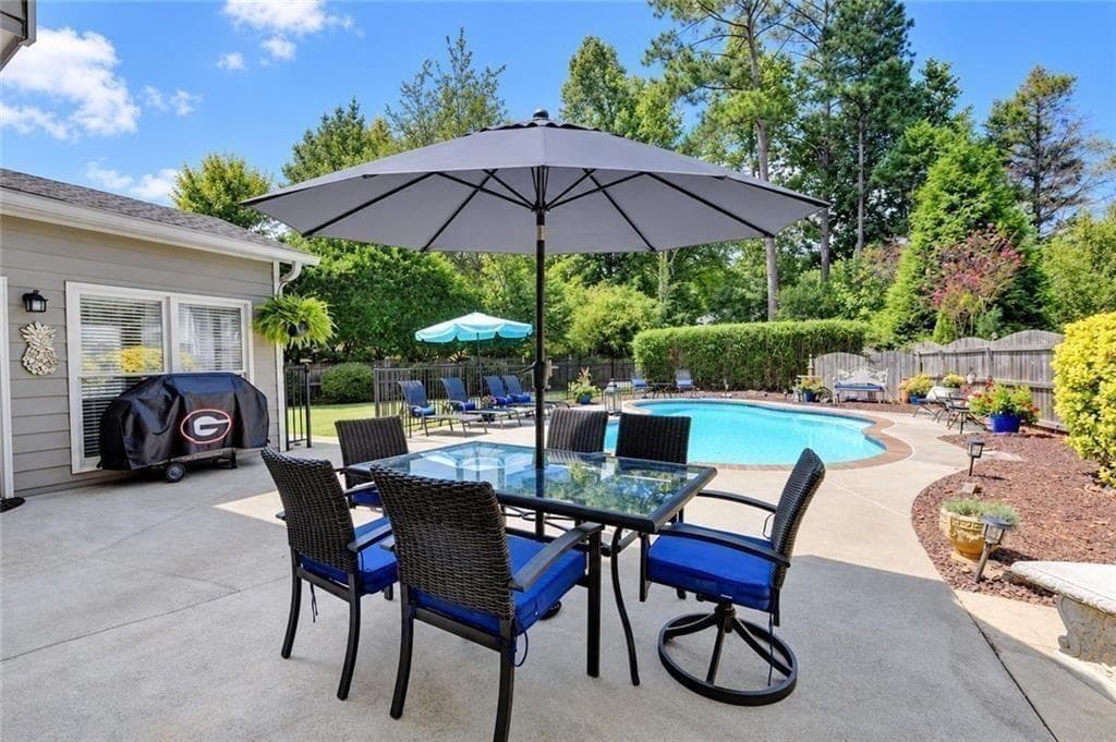 5 bedroom, 3 bathroom, 3,482 sq ft single family residence for sale at 5715 N Hillbrooke Trce, Johns Creek, GA 30005 — photo 7