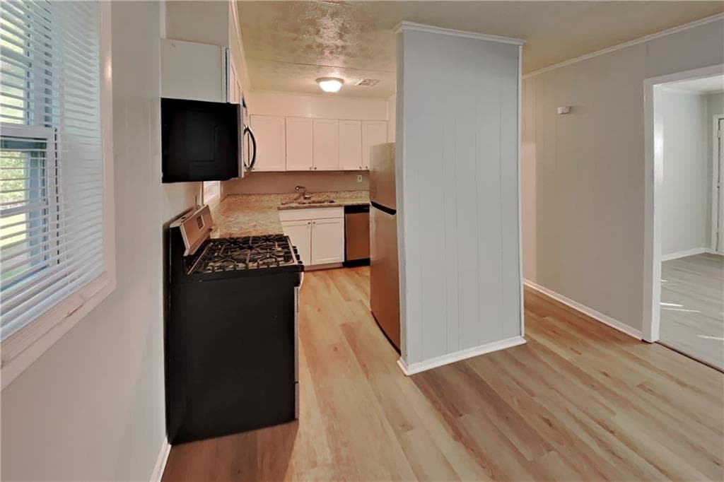 3 bedroom, 1 bathroom, 1,056 sq ft single family residence for rent at 6156 Water Oak Circle, Covington, GA 30014 for $1,385 a month — photo 2