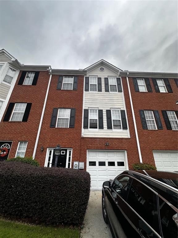 3 bedroom, 4 bathroom, 1,973 sq ft townhouse for sale at 2132 Millgate Lane, Buford, GA 30519