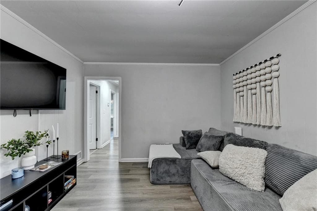 4 bedroom, 2 bathroom, 1,152 sq ft single family residence for sale at 3132 Forrest Hills Drive, Hapeville, GA 30354 — photo 5
