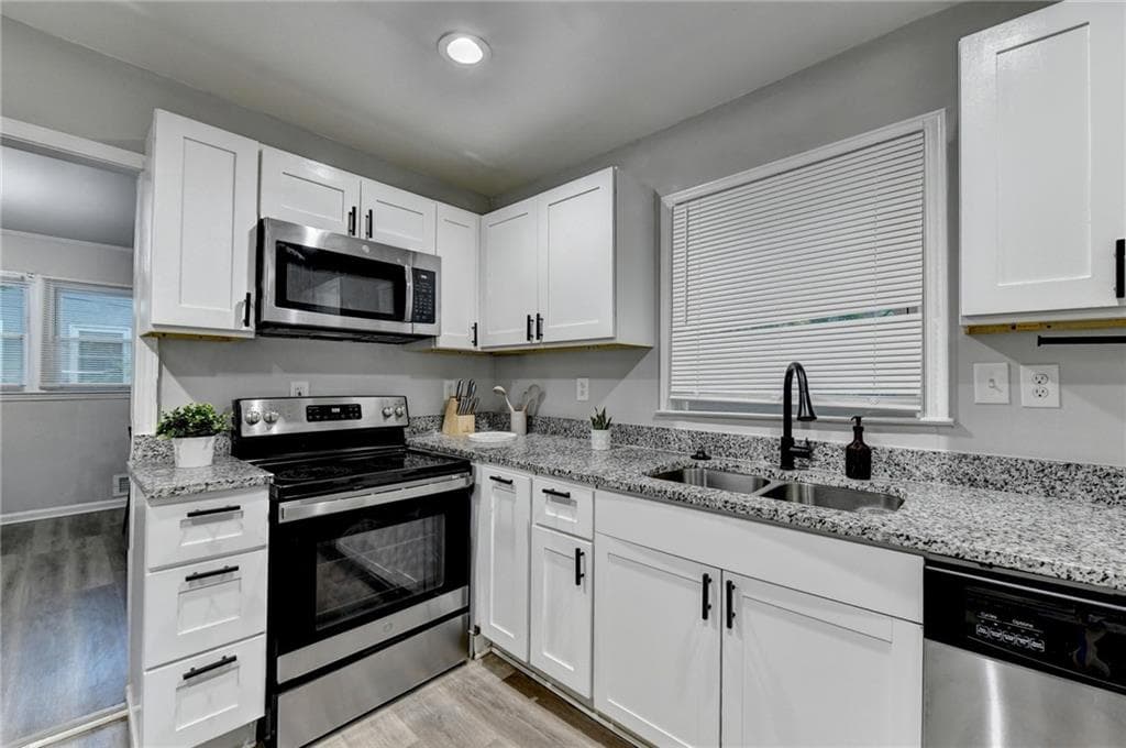 4 bedroom, 2 bathroom, 1,152 sq ft single family residence for sale at 3132 Forrest Hills Drive, Hapeville, GA 30354 — photo 10