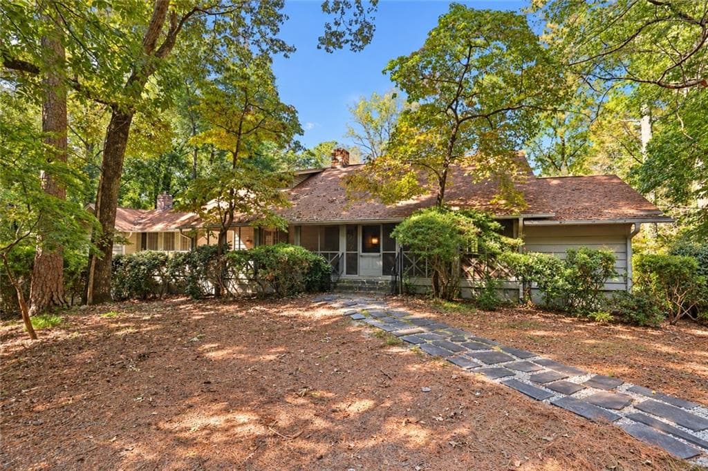 4 bedroom, 4 bathroom, 2,434 sq ft single family residence for sale at 8235 Tynecastle Drive, Sandy Springs, GA 30350 — photo 1 of 33