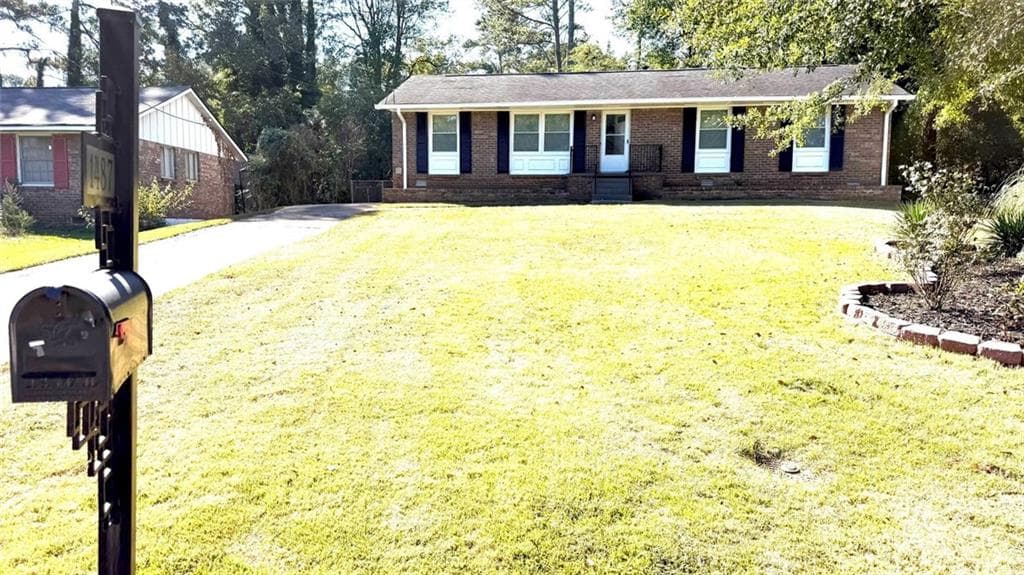 3 bedroom, 2 bathroom, 1,350 sq ft single family residence for sale at 1487 Colony East Circle, Stone Mountain, GA 30083 — photo 2