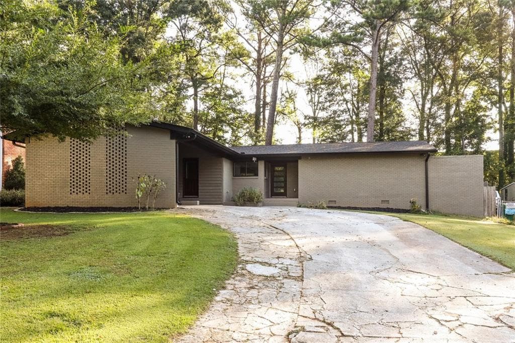 3 bedroom, 2 bathroom, 1,466 sq ft single family residence for sale at 1389 Sanden Ferry Drive, Decatur, GA 30033 — photo 2
