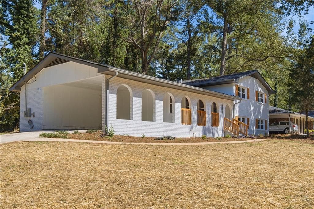 5 bedroom, 3 bathroom, 2,331 sq ft single family residence for sale at 4804 Thompson Mill Road, Lithonia, GA 30038 — photo 2