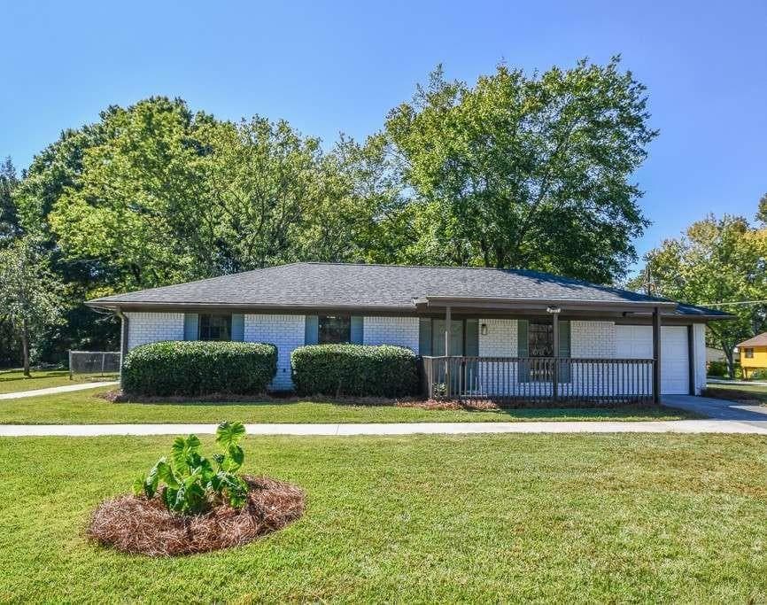4 bedroom, 3 bathroom, 1,746 sq ft single family residence for sale at 1871 Singer Way, Lithonia, GA 30058 — photo 1 of 19