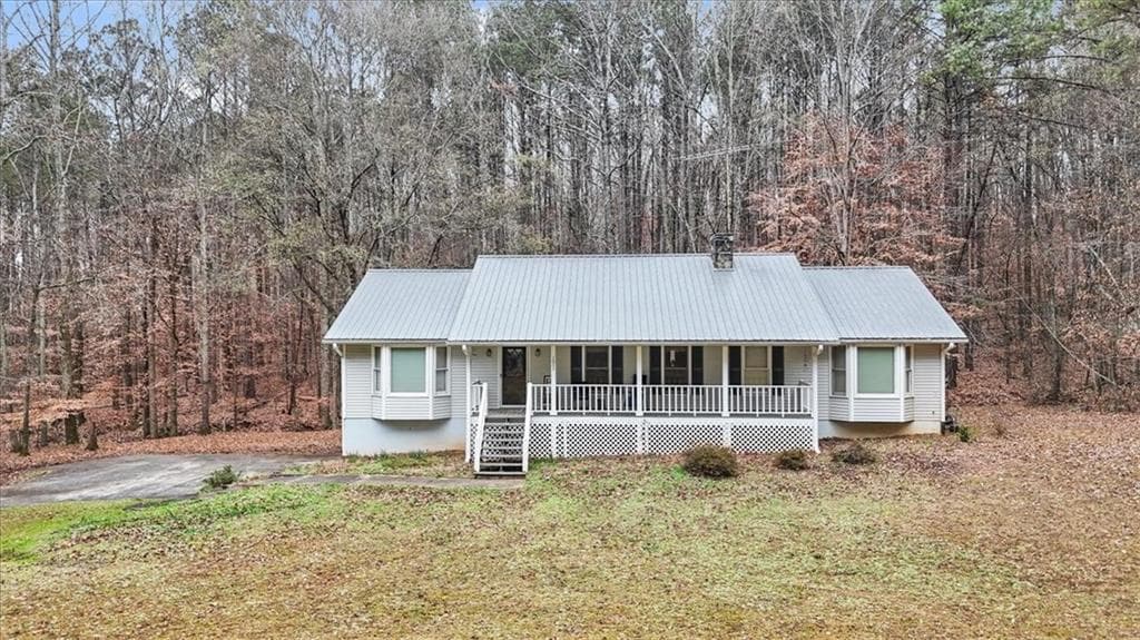 3 bedroom, 2 bathroom, 3,472 sq ft single family residence for sale at 1005 Johnson Brady Road, Canton, GA 30115 — photo 1 of 13