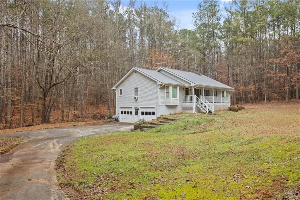 3 bedroom, 2 bathroom, 3,472 sq ft single family residence for sale at 1005 Johnson Brady Road, Canton, GA 30115 — photo 3