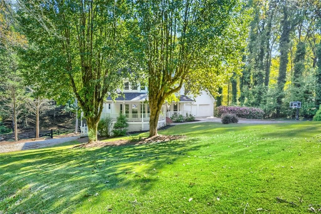 4 bedroom, 4 bathroom, 4,326 sq ft single family residence for sale at 1436 Old Mill Road, Ball Ground, GA 30107 — photo 3