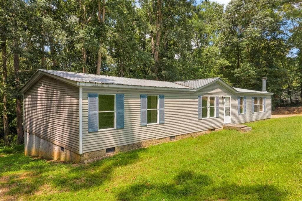 3 bedroom, 2 bathroom, 1,716 sq ft single family residence for sale at 515 Donald Cleveland Road, Mount Airy, GA 30563 — photo 3