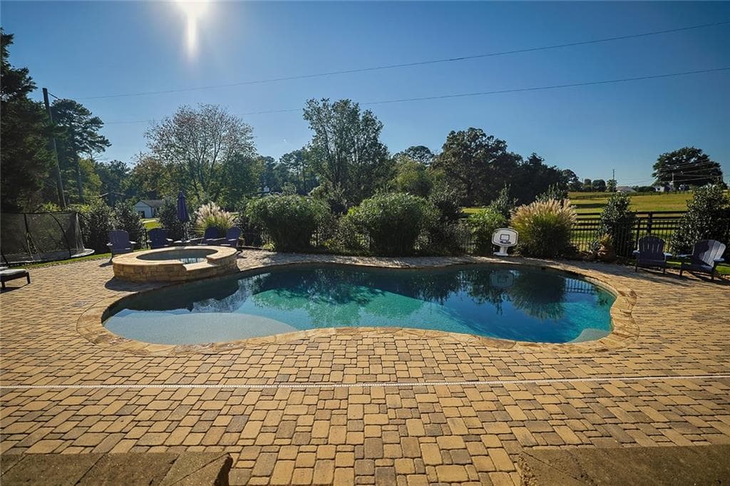 5 bedroom, 4 bathroom, 3,093 sq ft single family residence for sale at 1207 Olde Lexington Road, Hoschton, GA 30548 — photo 2