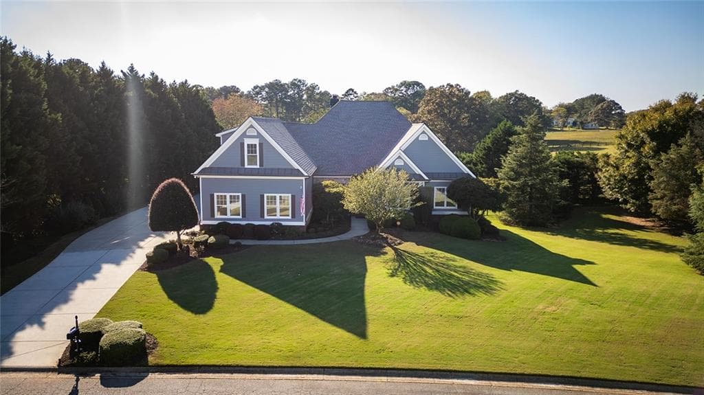 5 bedroom, 4 bathroom, 3,093 sq ft single family residence for sale at 1207 Olde Lexington Road, Hoschton, GA 30548 — photo 4