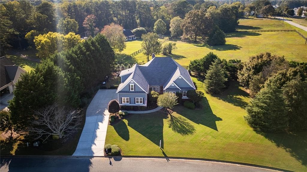 5 bedroom, 4 bathroom, 3,093 sq ft single family residence for sale at 1207 Olde Lexington Road, Hoschton, GA 30548 — photo 5