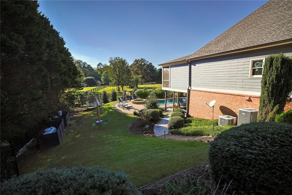 5 bedroom, 4 bathroom, 3,093 sq ft single family residence for sale at 1207 Olde Lexington Road, Hoschton, GA 30548 — photo 8