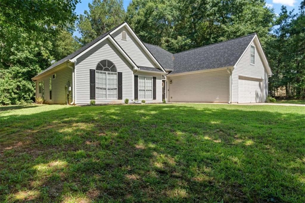 4 bedroom, 2 bathroom, 1,956 sq ft single family residence for sale at 420 Ray Way, Jenkinsburg, GA 30234 — photo 2