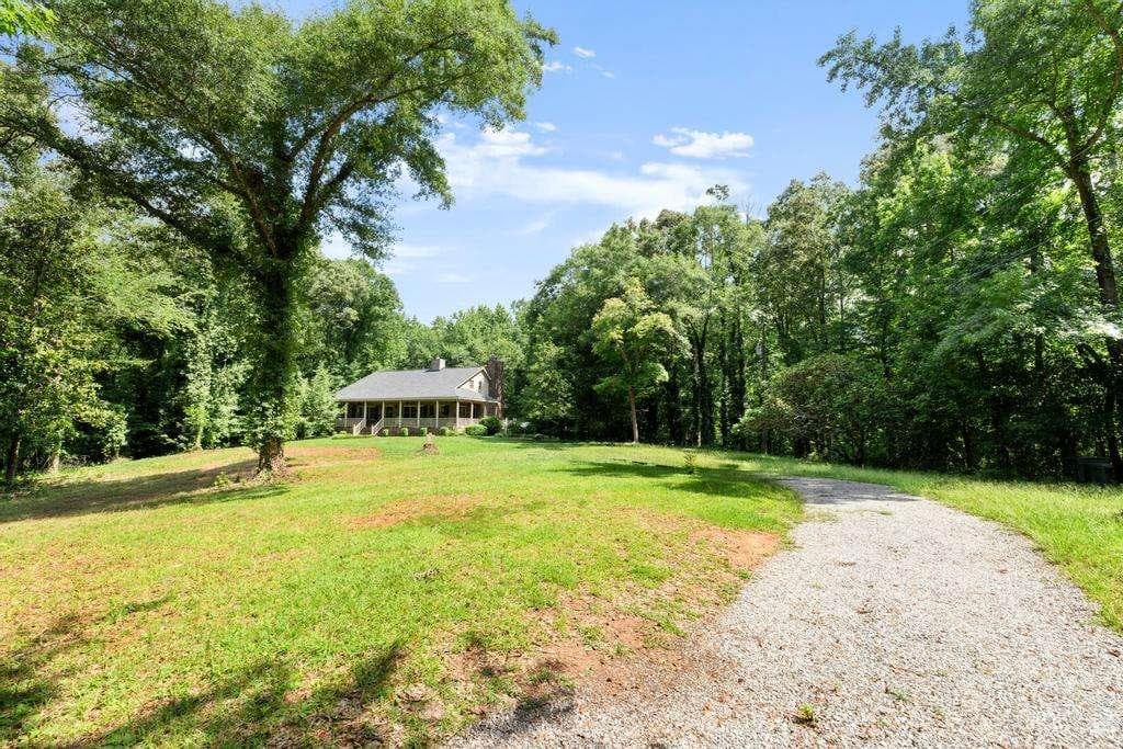 4 bedroom, 4 bathroom, 2,415 sq ft single family residence for sale at 151 Evans Road, Milner, GA 30257 — photo 2