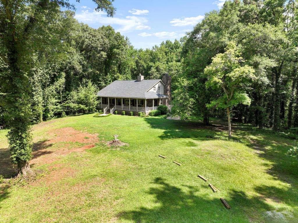 4 bedroom, 4 bathroom, 2,415 sq ft single family residence for sale at 151 Evans Road, Milner, GA 30257 — photo 3