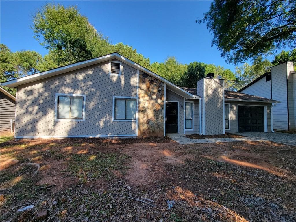 3 bedroom, 2 bathroom, 1,104 sq ft single family residence for sale at 3411 Rolling Ridge Road, Lawrenceville, GA 30044 — photo 1 of 22