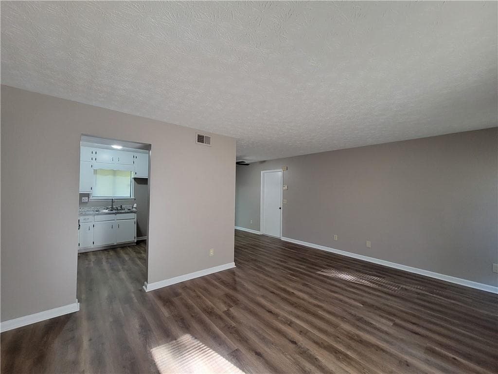 3 bedroom, 2 bathroom, 1,104 sq ft single family residence for sale at 3411 Rolling Ridge Road, Lawrenceville, GA 30044 — photo 2