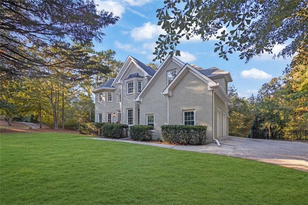 7 bedroom, 5 bathroom, 4,670 sq ft single family residence for sale at 100 Matthew Way, Fayetteville, GA 30214 — photo 2