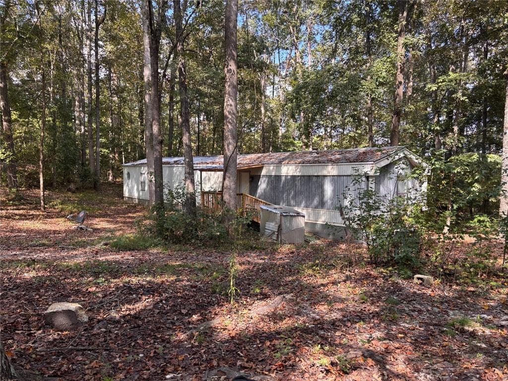 3 bedroom, 2 bathroom, 1,280 sq ft single family residence for sale at 12 Roberts Road, Whitesburg, GA 30185 — photo 2
