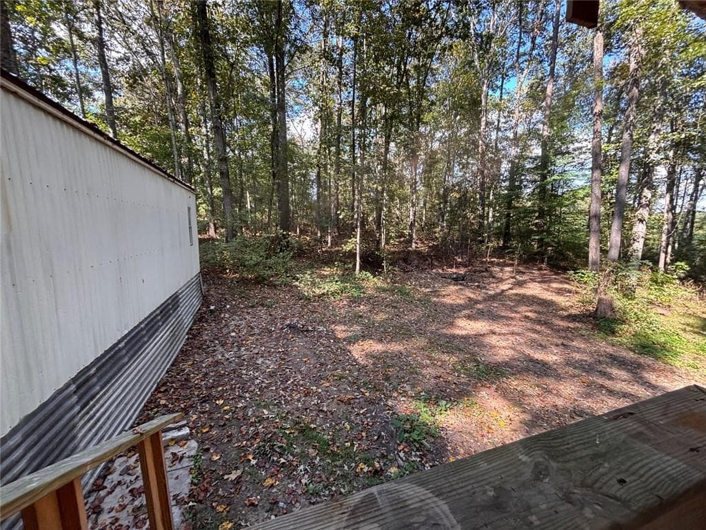 3 bedroom, 2 bathroom, 1,280 sq ft single family residence for sale at 12 Roberts Road, Whitesburg, GA 30185 — photo 3
