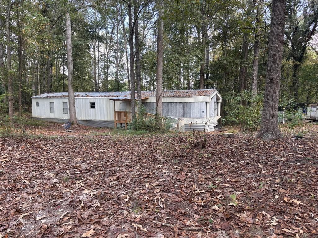 3 bedroom, 2 bathroom, 1,280 sq ft single family residence for sale at 12 Roberts Road, Whitesburg, GA 30185 — photo 5