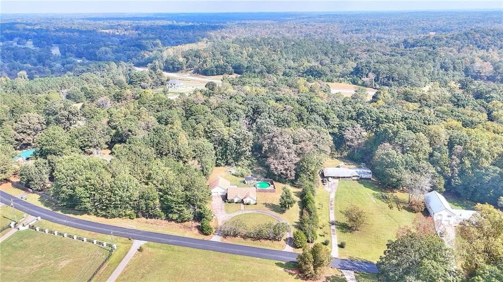 4 bedroom, 3 bathroom, 2,011 sq ft single family residence for sale at 1234 Cabin Bridge Road, Bethlehem, GA 30620 — photo 2
