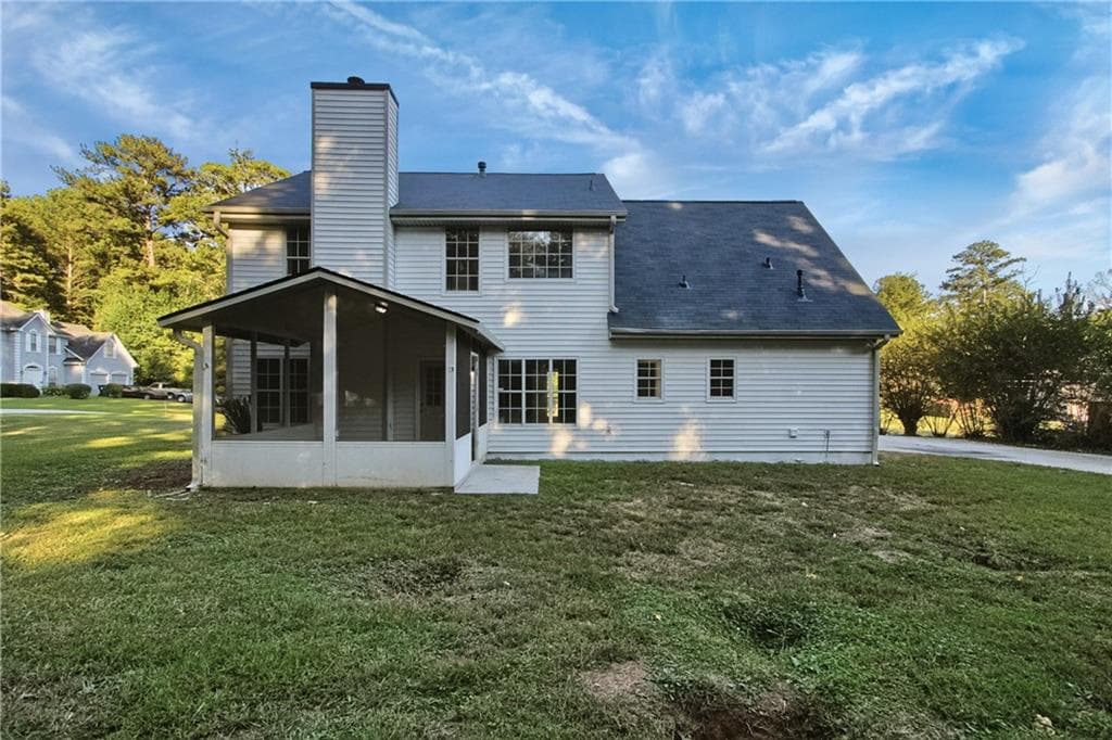 4 bedroom, 2 bathroom, 1,784 sq ft single family residence for sale at 6833 Sarah Jane Lane, Riverdale, GA 30296 — photo 5