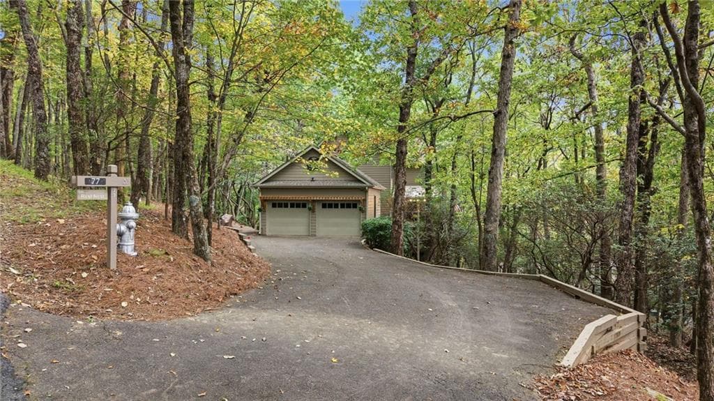 4 bedroom, 4 bathroom, 2,905 sq ft single family residence for sale at 77 Raccoon Run Lane, Big Canoe, GA 30143 — photo 3