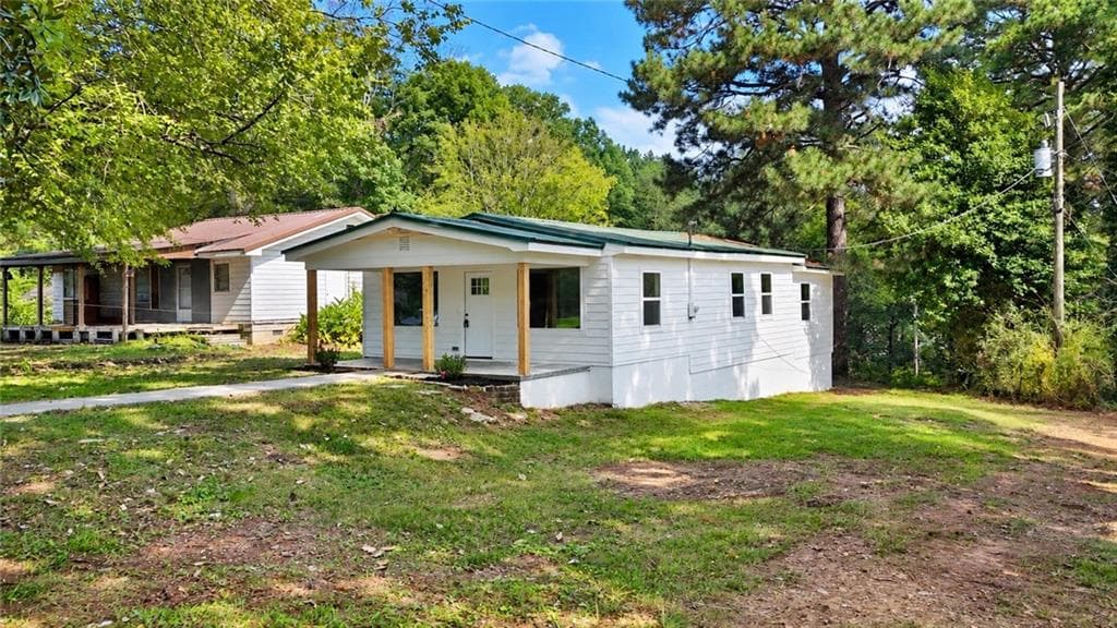 3 bedroom, 1 bathroom, 1,176 sq ft single family residence for sale at 1051 Cavender Road, Dalton, GA 30721 — photo 3