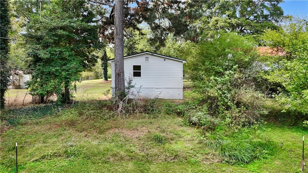 3 bedroom, 1 bathroom, 1,176 sq ft single family residence for sale at 1051 Cavender Road, Dalton, GA 30721 — photo 6