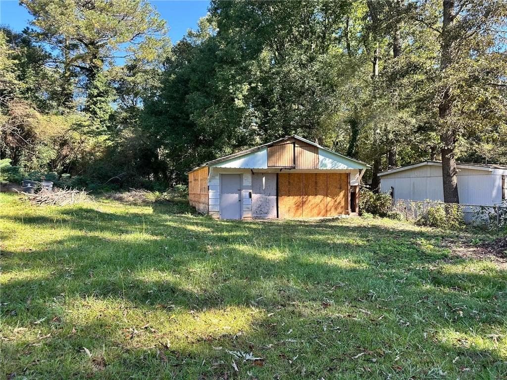 4 bedroom, 2 bathroom, 1,976 sq ft single family residence for sale at 65 Little John Trail, Hampton, GA 30228 — photo 4