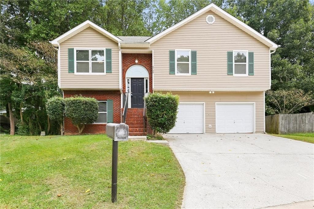 4 bedroom, 3 bathroom, 1,716 sq ft single family residence for rent at 5730 Broadleaf Way, Atlanta, GA 30349 for $2,180 a month — photo 1 of 17