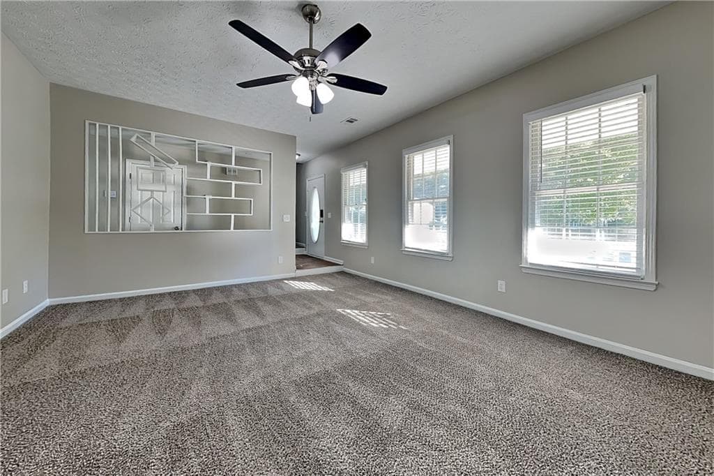 3 bedroom, 3 bathroom, 2,232 sq ft single family residence for rent at 737 Wilkes Drive, Loganville, GA 30052 for $2,350 a month — photo 2