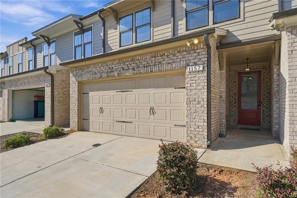3 bedroom, 3 bathroom, 2,366 sq ft townhouse for sale at 1157 Lucan Lane, Lawrenceville, GA 30043 — photo 1 of 46
