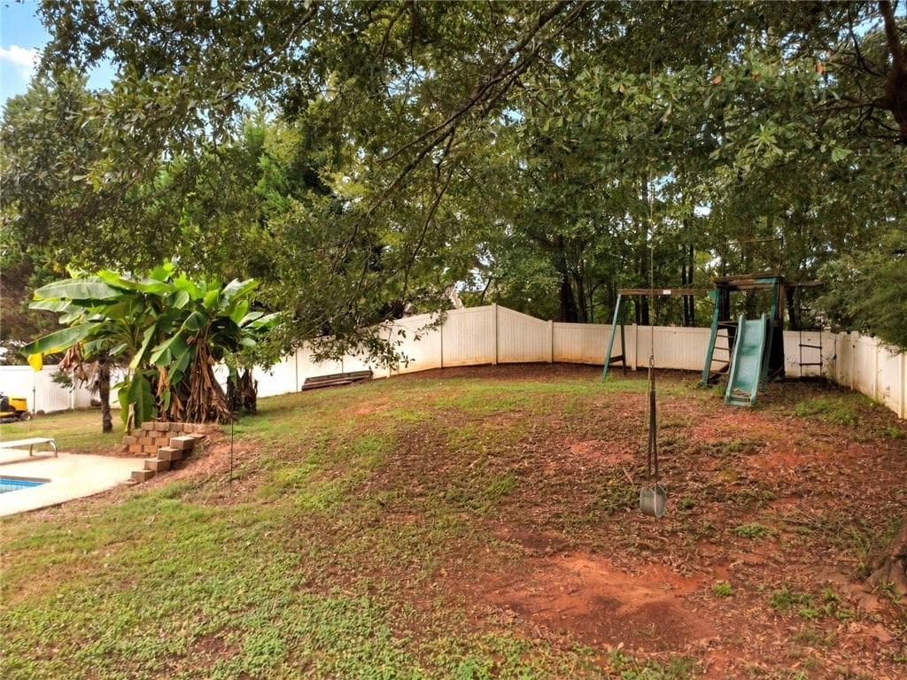 3 bedroom, 2 bathroom, 1,591 sq ft single family residence for sale at 513 WYLDEROSE LN., Locust Grove, GA 30248 — photo 9