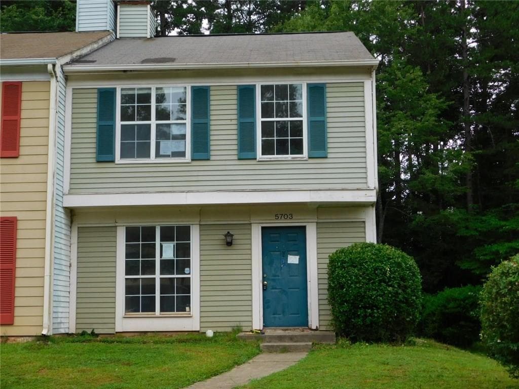 2 bedroom, 3 bathroom, 1,160 sq ft townhouse for sale at 5703 Wells Circle, Stone Mountain, GA 30087 — photo 1 of 1