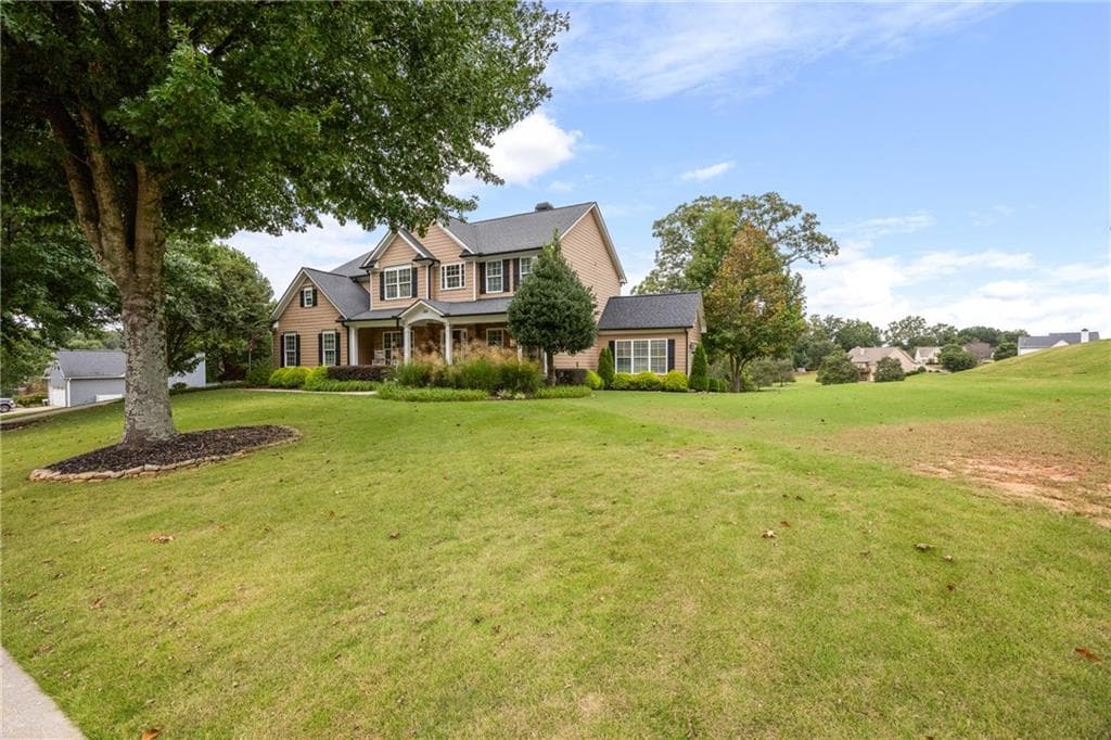 6 bedroom, 4 bathroom, 4,110 sq ft single family residence for sale at 258 Downing Street, Hoschton, GA 30548 — photo 3