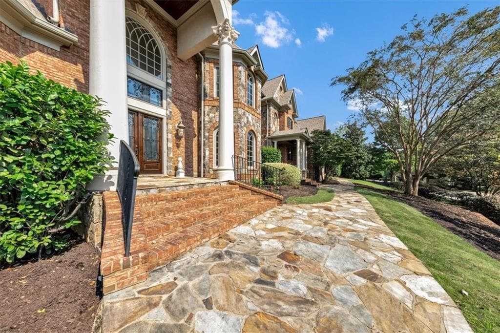 7 bedroom, 7 bathroom, 10,800 sq ft single family residence for sale at 3124 Watsons Bend, Milton, GA 30004 — photo 9