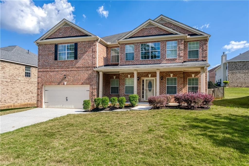 5 bedroom, 4 bathroom, 4,035 sq ft single family residence for sale at 3772 SUNBRIDGE Drive, Snellville, GA 30039 — photo 1 of 41